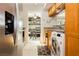 Kitchen featuring stainless steel appliances with a view into an adjacent bedroom at 737 Oakmont Ave # 1202, Las Vegas, NV 89109
