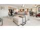 Open concept condo featuring open kitchen, dining area, and cozy living room at 737 Oakmont Ave # 1202, Las Vegas, NV 89109