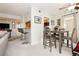 Modern condo living space featuring open kitchen and dining area at 737 Oakmont Ave # 1202, Las Vegas, NV 89109