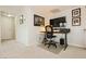 Office nook with a black desk and comfortable black chair at 737 Oakmont Ave # 1202, Las Vegas, NV 89109