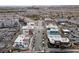 An aerial view of a neighborhood with townhomes and businesses, with ample parking available at 7544 Nicklin St, Las Vegas, NV 89143