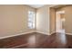 This bedroom has wood floors, neutral paint, and a window at 7685 Gilespie St, Las Vegas, NV 89123