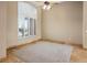 Bedroom with travertine floors and large shuttered windows at 7685 Gilespie St, Las Vegas, NV 89123