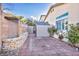 Backyard view featuring a storage shed and a greenhouse, great for gardening enthusiasts at 8406 Belmont Valley St, Las Vegas, NV 89123