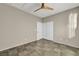 Bedroom featuring a modern ceiling fan and tiled floor at 8406 Belmont Valley St, Las Vegas, NV 89123