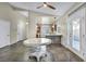 Bright dining area with tile floor, ceiling fan, and kitchen view at 8406 Belmont Valley St, Las Vegas, NV 89123