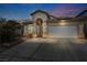 Charming single-story home featuring a two-car garage, covered entrance, and well-maintained landscaping at 8406 Belmont Valley St, Las Vegas, NV 89123