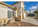 Single-story home showcasing desert landscaping and a convenient two-car garage at 8406 Belmont Valley St, Las Vegas, NV 89123