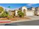 Beautiful single-story home with desert landscaping, a two-car garage, and solar panels at 8406 Belmont Valley St, Las Vegas, NV 89123