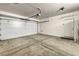 A clean, spacious two car garage with an automatic door and side door access at 8406 Belmont Valley St, Las Vegas, NV 89123