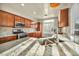 Bright kitchen with granite counters, stainless appliances, and stylish tile backsplash at 8406 Belmont Valley St, Las Vegas, NV 89123
