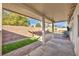 Inviting covered patio with views of the backyard and pool area at 8406 Belmont Valley St, Las Vegas, NV 89123