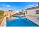 Inviting pool and spa nestled in a private backyard setting, perfect for summer fun at 8406 Belmont Valley St, Las Vegas, NV 89123