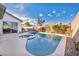 Private backyard pool and spa, an ideal space for relaxation and outdoor gatherings at 8406 Belmont Valley St, Las Vegas, NV 89123