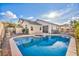 Backyard oasis with a refreshing swimming pool and spa, ideal for outdoor enjoyment at 8406 Belmont Valley St, Las Vegas, NV 89123