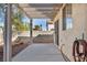Patio area with pergola, desert landscaping, and privacy fence at 8732 Majestic Pine Ave, Las Vegas, NV 89143