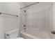 Bathroom showcasing a clean white tiled shower and tub combination at 8732 Majestic Pine Ave, Las Vegas, NV 89143