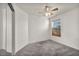 Inviting bedroom with a ceiling fan and window with wooden blinds at 8732 Majestic Pine Ave, Las Vegas, NV 89143