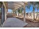 Covered patio area with a concrete floor, perfect for outdoor entertaining at 8732 Majestic Pine Ave, Las Vegas, NV 89143