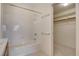 Clean bathroom with tub, shower, and closet at 908 Domnus Ln # 203, Las Vegas, NV 89144