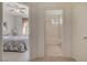Hallway view showing a bedroom on the left and bathroom on the right at 908 Domnus Ln # 203, Las Vegas, NV 89144