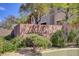 Beautiful Cierra community entrance with lush landscaping, creating a welcoming and prestigious first impression at 908 Domnus Ln # 203, Las Vegas, NV 89144
