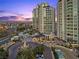 Luxury high rise with a beautiful circular driveway, fountain and mature landscaping at 9101 Alta Dr # 205, Las Vegas, NV 89145