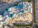Aerial view of a luxury high rise condominium building with parking and other amenities at 9101 Alta Dr # 205, Las Vegas, NV 89145