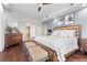 Comfortable bedroom with hardwood floors, staged with furnishings, and designer decor at 9101 Alta Dr # 205, Las Vegas, NV 89145