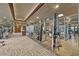 Spacious gym equipped with modern exercise equipment and mirrored walls at 9101 Alta Dr # 205, Las Vegas, NV 89145