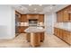 Spacious kitchen with stainless steel appliances, granite counters, and custom wood cabinetry at 9101 Alta Dr # 205, Las Vegas, NV 89145