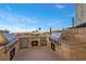 Outdoor kitchen area featuring stainless steel gas grills set in a stone countertop and wall at 9101 Alta Dr # 205, Las Vegas, NV 89145