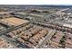 Community aerial shot of the neighborhood showing proximity to nearby shopping, businesses, and roadways at 9526 Vast Valley Ave, Las Vegas, NV 89148