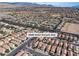 An aerial perspective showcases the property location at 9526 Vast Valley Ave with mountain views at 9526 Vast Valley Ave, Las Vegas, NV 89148