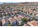 A neighborhood view showcases the property with mountain views in the distance at 9526 Vast Valley Ave, Las Vegas, NV 89148