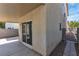 Home's backyard with covered patio, block wall, and side access at 9526 Vast Valley Ave, Las Vegas, NV 89148
