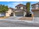 Charming two-story home featuring a tile roof and a spacious two-car garage at 9526 Vast Valley Ave, Las Vegas, NV 89148