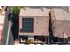 Aerial view of a roof with solar panels installed, surrounded by other houses at 9555 Belle Fountain Ave, Las Vegas, NV 89123