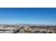 Aerial view of cityscape featuring buildings, mountains, and clear blue sky at 9555 Belle Fountain Ave, Las Vegas, NV 89123