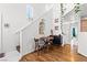 Cozy dining nook with wood floors, modern table set, and bright lighting at 9555 Belle Fountain Ave, Las Vegas, NV 89123