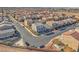 Neighborhood aerial showcases a well-planned community with numerous homes in a desert landscape at 9783 Hawk Crest St, Las Vegas, NV 89141