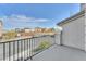 Balcony view overlooking the neighborhood showcasing other homes in the community and landscape at 9783 Hawk Crest St, Las Vegas, NV 89141