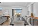 Open concept dining area with modern table and chairs at 9783 Hawk Crest St, Las Vegas, NV 89141