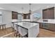 Stylish kitchen island with seating, modern appliances, and plenty of counter space at 9783 Hawk Crest St, Las Vegas, NV 89141