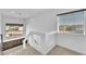 Upstairs landing features built-in cabinets and a window offering natural light at 9783 Hawk Crest St, Las Vegas, NV 89141