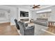 Bright living room features modern fireplace, recessed lights, and ceiling fan at 9783 Hawk Crest St, Las Vegas, NV 89141
