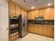 Well-equipped kitchen with stainless steel appliances and ample cabinetry at 10657 Blue Nile Ct, Las Vegas, NV 89144