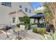 A backyard patio with comfortable seating, landscaping, and an inviting gazebo at 2864 Cape Verde Ln, Las Vegas, NV 89128