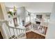 A beautiful foyer with wood and tile flooring overlooking the spacious living room at 2864 Cape Verde Ln, Las Vegas, NV 89128