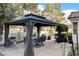 Gazebo with an outdoor dining set providing a perfect place to relax and entertain at 2864 Cape Verde Ln, Las Vegas, NV 89128